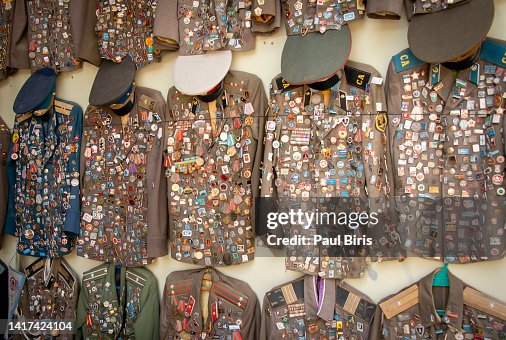 Set of colorful labels, stickers, medals, badges mostly sports from former Soviet Union on open market in Bukhara, Uzbekistan