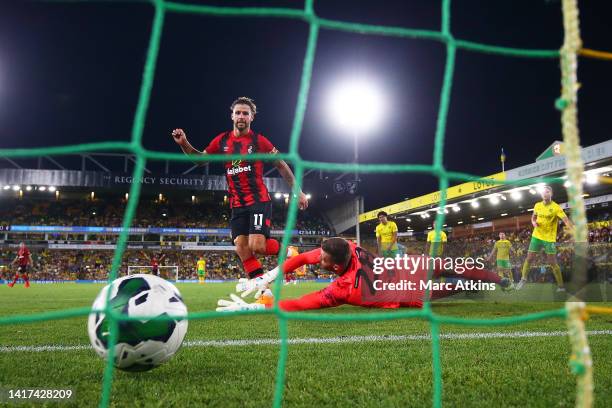 Emiliano Marcondes of AFC Bournemouth scores their team's first goal past Angus Gunn of Norwich City during the Carabao Cup Second Round match...