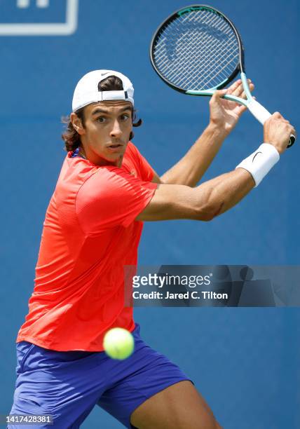 Lorenzo Musetti of Italy returns a shot from Richard Gasquet of France during their second round match on day four of the Winston-Salem Open at Wake...