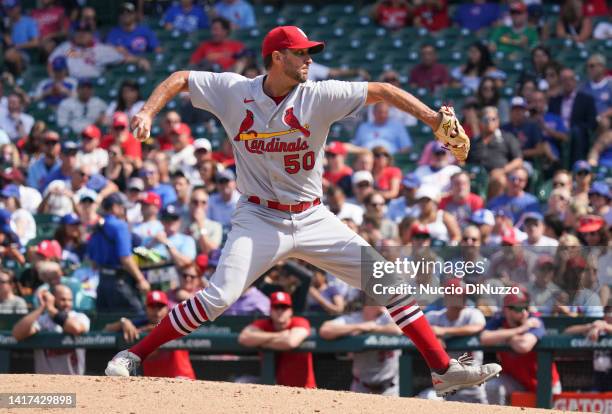 Adam Wainwright of the St. Louis Cardinals throws a pitch during the fourth inning of Game One of a doubleheader against the Chicago Cubs at Wrigley...