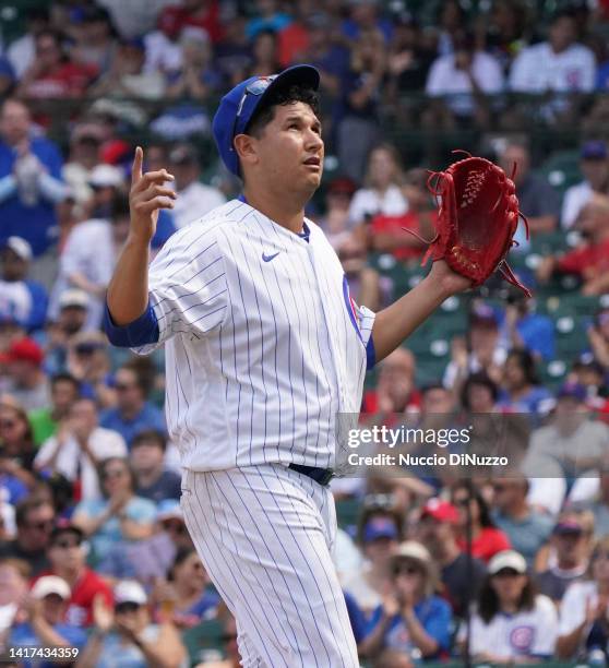 Javier Assad of the Chicago Cubs reacts after being removed during the fifth inning of Game One of a doubleheader against the St. Louis Cardinals at...