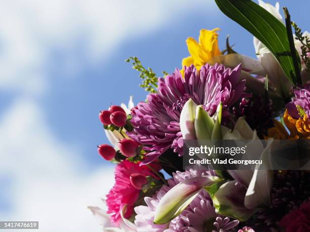 a bouquet of flowers - funeral flowers stock pictures, royalty-free photos & images