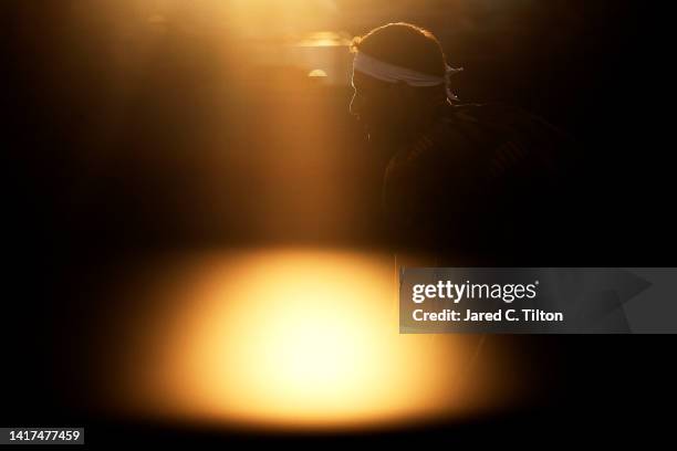 Grigor Dimitrov of Bulgaria prepares to serve to Dominic Thiem of Austria during their second round match on day four of the Winston-Salem Open at...