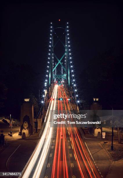 View of car traffic at night on the Lions Gate Bridge as seen from Stanley Park on August 5, 2009 in Vancouver, Canada.