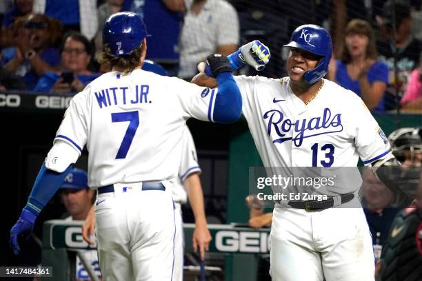 Bobby Witt Jr. #7 of the Kansas City Royals celebrates his home run with Salvador Perez in the fourth inning against the Arizona Diamondbacks at...