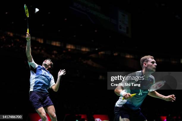 Mark Lamsfuss and Marvin Seidel of Germany compete in the Men's Doubles Second Round match against Christopher Grimley and Matthew Grimley of...