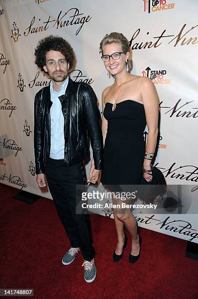 Actor Isaac Kappy and a guest arrive at the interactive evening celebrating the Saint Vintage Love Tour benefiting Stand Up 2 Cancer hosted by Jaime...