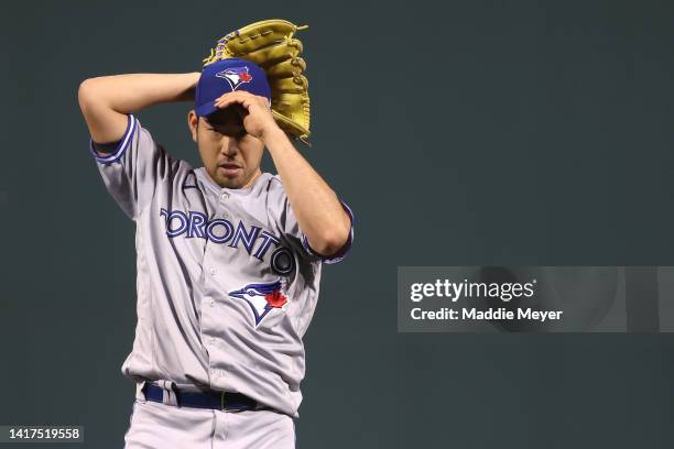 Yusei Kikuchi of the Toronto Blue Jays prepares to pitch against the Boston Red Sox during the seventh inning at Fenway Park on August 23, 2022 in...