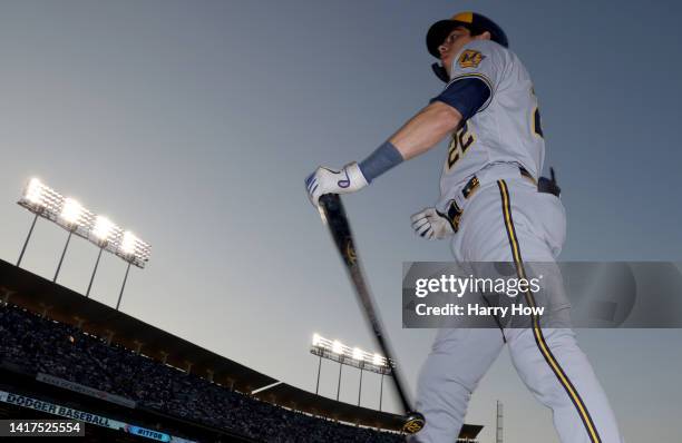 Christian Yelich of the Milwaukee Brewers walks on deck to lead off the game against the Los Angeles Dodgers at Dodger Stadium on August 23, 2022 in...