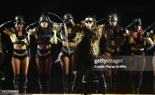 Daddy Yankee performs onstage during his "La Última Vuelta World" tour at State Farm Arena on August 23, 2022 in Atlanta, Georgia.