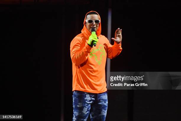 Daddy Yankee performs onstage during his "La Última Vuelta World" tour at State Farm Arena on August 23, 2022 in Atlanta, Georgia.