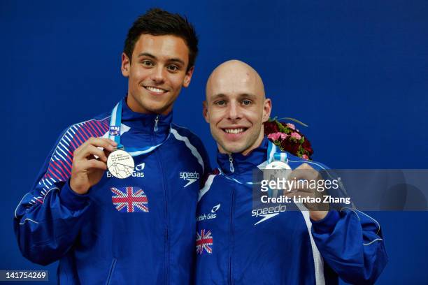 Tom Daley and Peter Waterfield of Great Britain poses with the Silver medal after the Men's 10m Platform Synchro Final during day one of the...