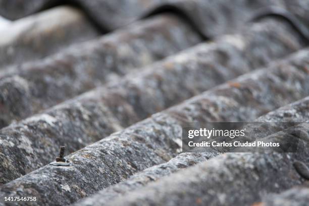 detail of asbestos roof - asbestos stock pictures, royalty-free photos & images
