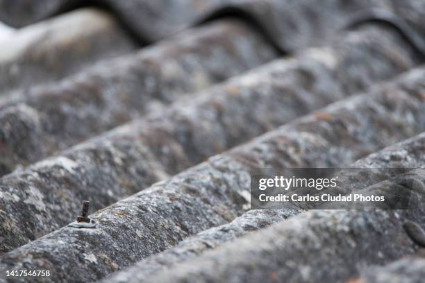 detail of asbestos roof - roof texture stock pictures, royalty-free photos & images