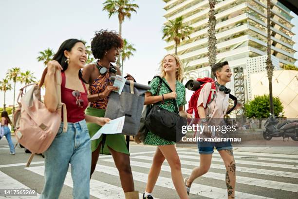 carefree female friends leaving on vacation - girls of spain stock pictures, royalty-free photos & images