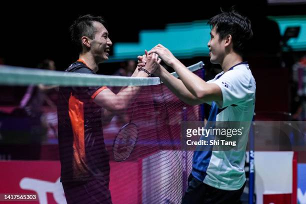 Wong Wing Ki Vincent of Hong Kong greets Ng Ka Long Angus of Hong Kong after their Men's Singles Second Round match on day three of the BWF World...