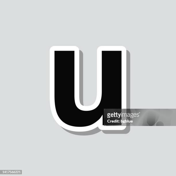 letter u. icon sticker on gray background - letter u stock illustrations