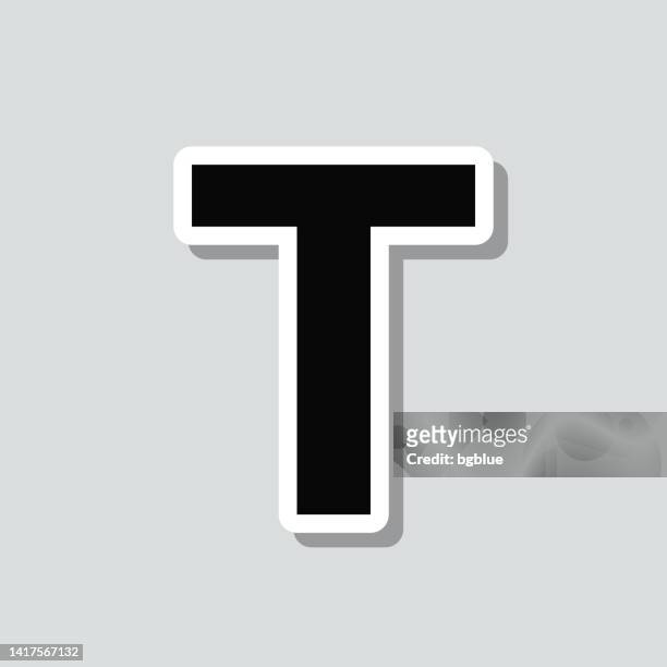 letter t. icon sticker on gray background - kreativität stock illustrations