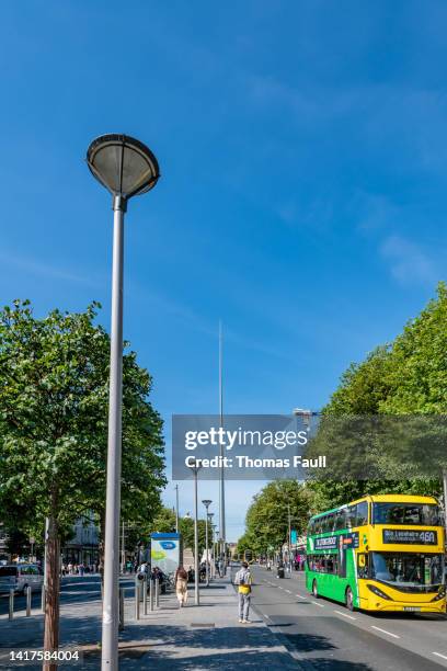 the spire in dublin - dublin bus stock pictures, royalty-free photos & images