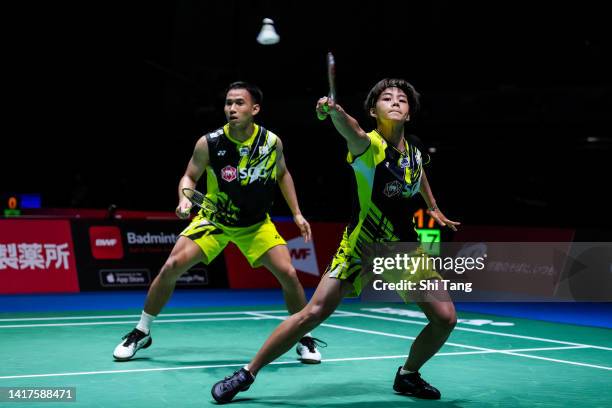 Dechapol Puavaranukroh and Sapsiree Taerattanachai of Thailand compete in the Mixed Doubles Second Round match against Choi Sol Gyu and Shin Seung...