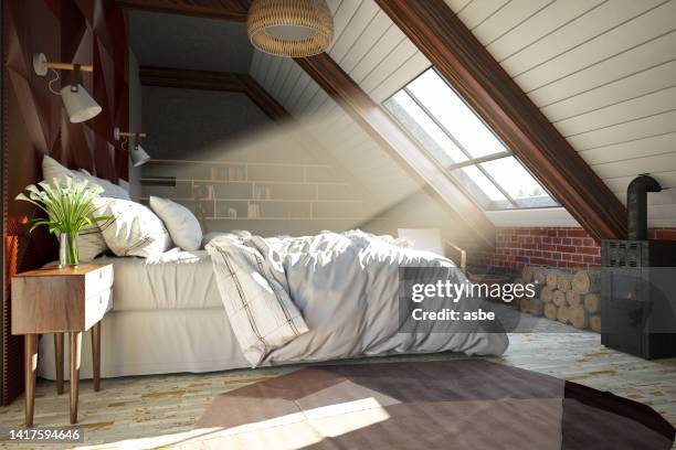 loft bedroom in the attic with sunbeam through the window - sun rays through window bildbanksfoton och bilder