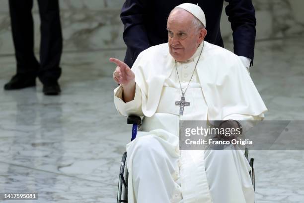 Pope Francis leaves the Paul VI Hall at the end of his weekly general audience on August 24, 2022 in Vatican City, Vatican. Pope Francis will preside...