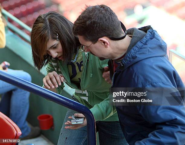 At Fenway Park, a red-tailed hawk attacked Alexa Rodriguez from Memorial Boulevard Middle School in Bristol, Conn., as she is helped away by her...