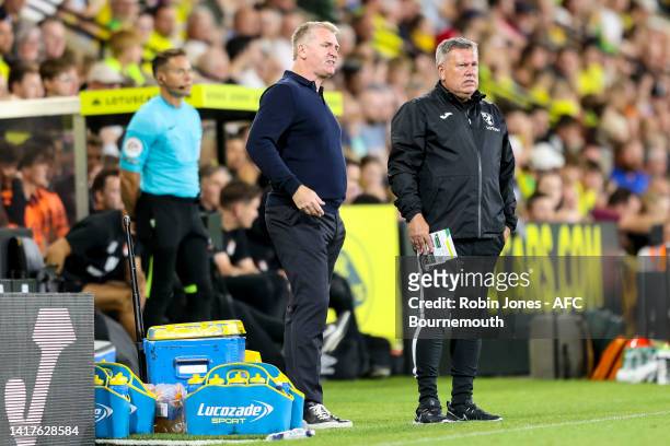 Head Coach Dean Smith with assistant Craig Shakespeare of Norwich City during the Carabao Cup Second Round match between Norwich City and AFC...