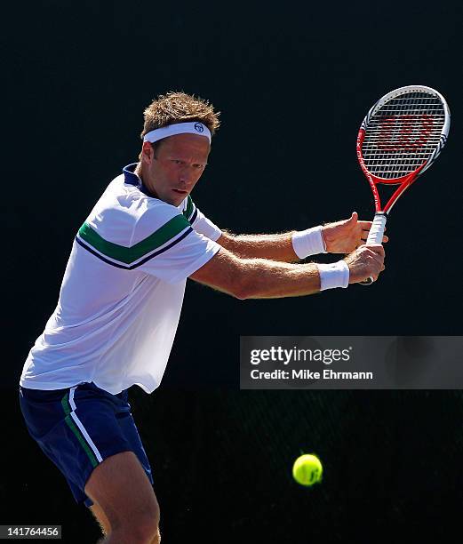 Robert Lindstedt of Sweden in action against David Marrero and Fernando Verdasco of Spain playing with Horia Tecau of Romania during Day 5 of the...