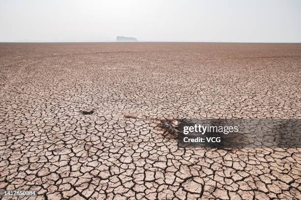 The lakebed of China's largest freshwater lake, Poyang, is exposed due to high temperatures and drought on August 24, 2022 in Hukou County, Jiujiang...