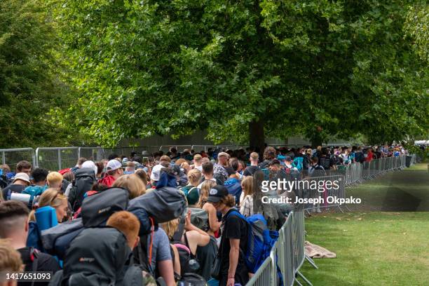 General view of early bird festival campers standing in the queue at Reading Festival on August 24, 2022 in Reading, England.