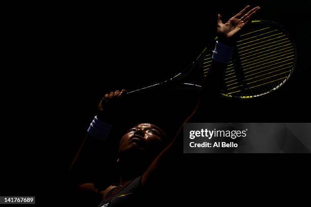 Vania King of the USA serves to Ana Ivanovic of Serbia during Day 5 at Crandon Park Tennis Center at the Sony Ericsson Open on March 23, 2012 in Key...