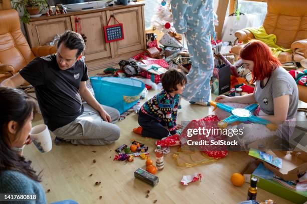 let's play with my new toy! - christmas morning stock pictures, royalty-free photos & images