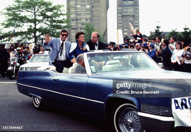 Al and Clare Arbour and Bill Torrey New York Islanders celebrate a Stanley Cup victory circa 1980 in Uniondale, New York.