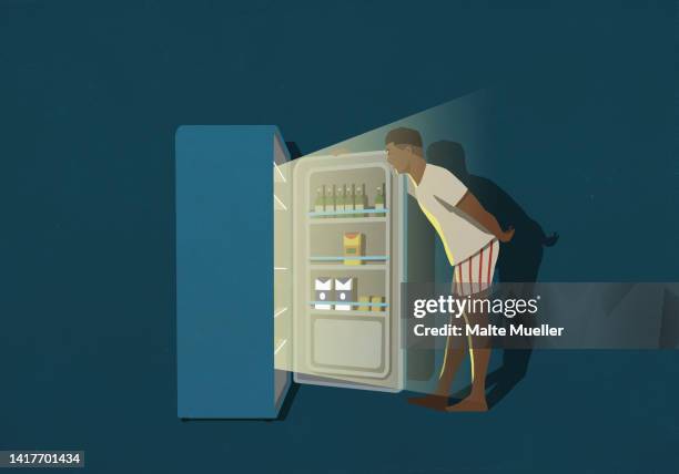 illustrations, cliparts, dessins animés et icônes de man standing at open refrigerator in kitchen at night - caleçon