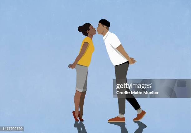 couple kissing face to face on blue background - liebespaar stock-grafiken, -clipart, -cartoons und -symbole
