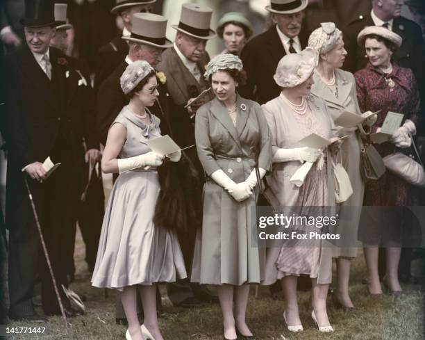 Princess Margaret , Queen Elizabeth II and the Queen Mother at the Oaks Stakes, Epsom Downs Racecourse, Surrey, 6th June 1958.