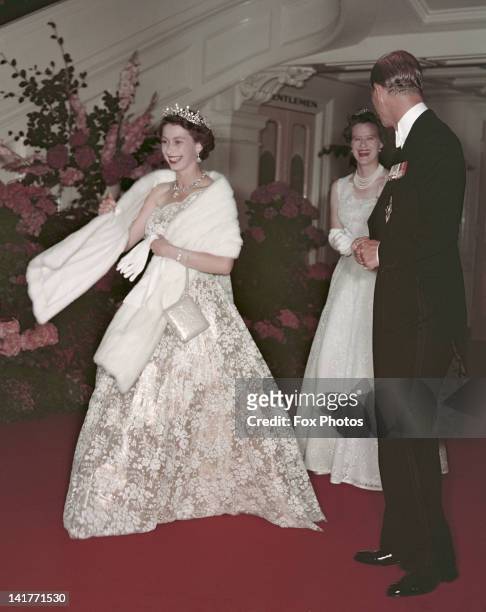 Queen Elizabeth II and Prince Philip leave a banquet during their Commonwealth visit to Australia, 1954.