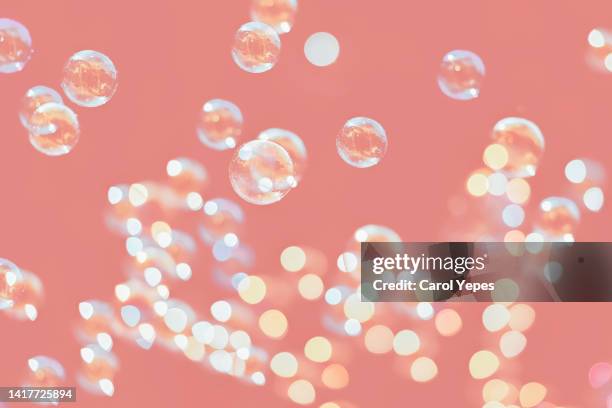 soap bubbles in pink background, conceptual - harmony fotografías e imágenes de stock