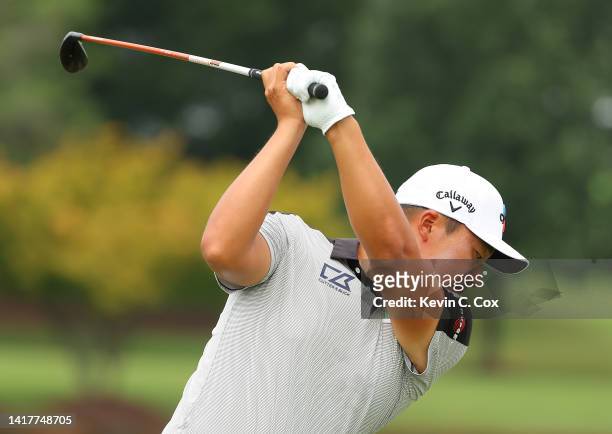 Lee of Korea warms up on the driving range during a practice round prior to the TOUR Championship at East Lake Golf Club on August 24, 2022 in...