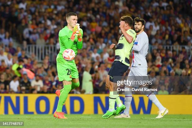 Julian Alvarez of Manchester City scores their team's first goal past Inaki Pena Sotorres of FC Barcelona during the friendly match between FC...