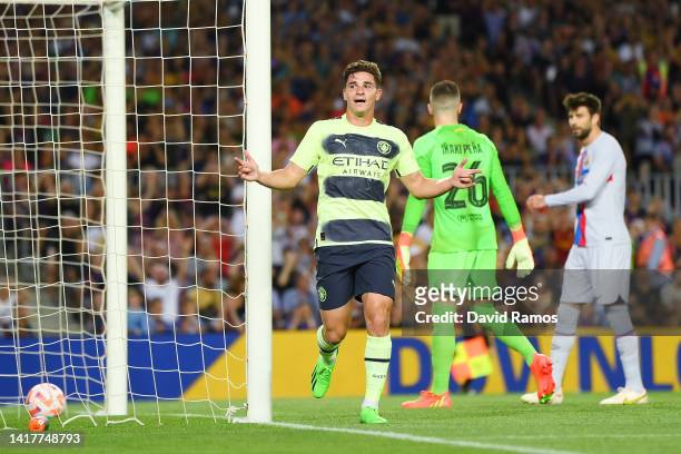 Julian Alvarez of Manchester City celebrates after scoring their team's first goal during the friendly match between FC Barcelona and Manchester City...
