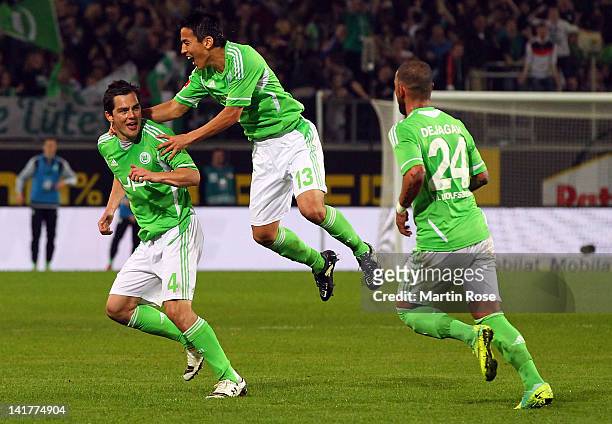 Marcel Schaefer of Wolfsburg celebrates after he scores his team's 2nd goal during the Bundesliga match between VfL Wolfsburg and Hamburger SV at the...