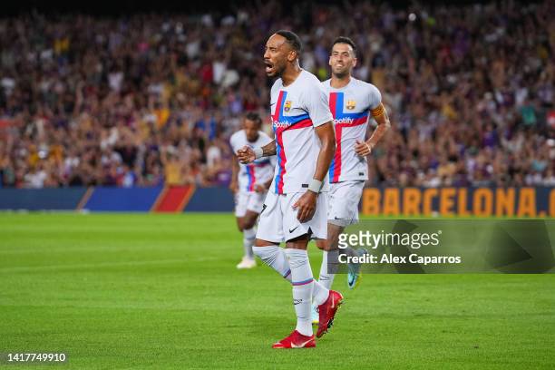 Pierre-Emerick Aubameyang of FC Barcelona celebrates after scoring their team's first goal during the friendly match between FC Barcelona and...