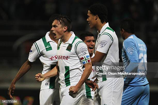 Captain, Petter Andersson of Groningen leads celebrations after the Eredivisie match between SC Excelsior Rotterdam and FC Groningen at Woudestein...