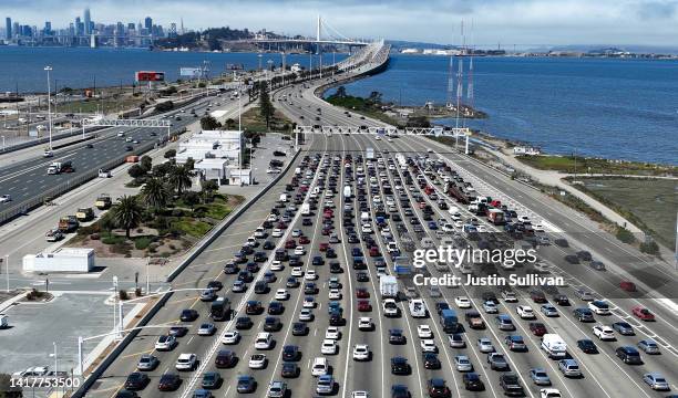 Traffic backs up at the San Francisco-Oakland Bay Bridge toll plaza on August 24, 2022 in Oakland, California. California is set to implement a plan...