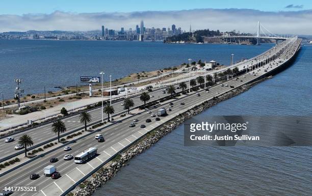 In an aerial view, traffic moves on the San Francisco-Oakland Bay Bridge on August 24, 2022 in Oakland, California. California is set to implement a...