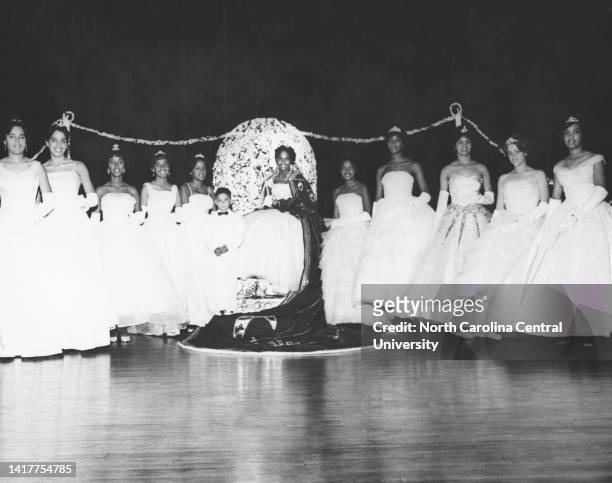 Miss Constance L. Black, "Miss North Carolina College," is shown with this happy group following her coronation as campus queen recently at the...