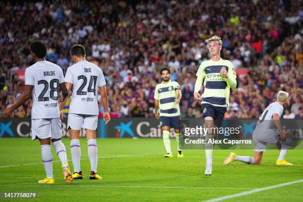 Cole Palmer of Manchester City celebrates after scoring their team's second goal during the friendly match between FC Barcelona and Manchester City...