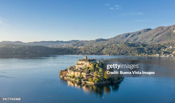 small island in an italian lake - lake orta stock pictures, royalty-free photos & images